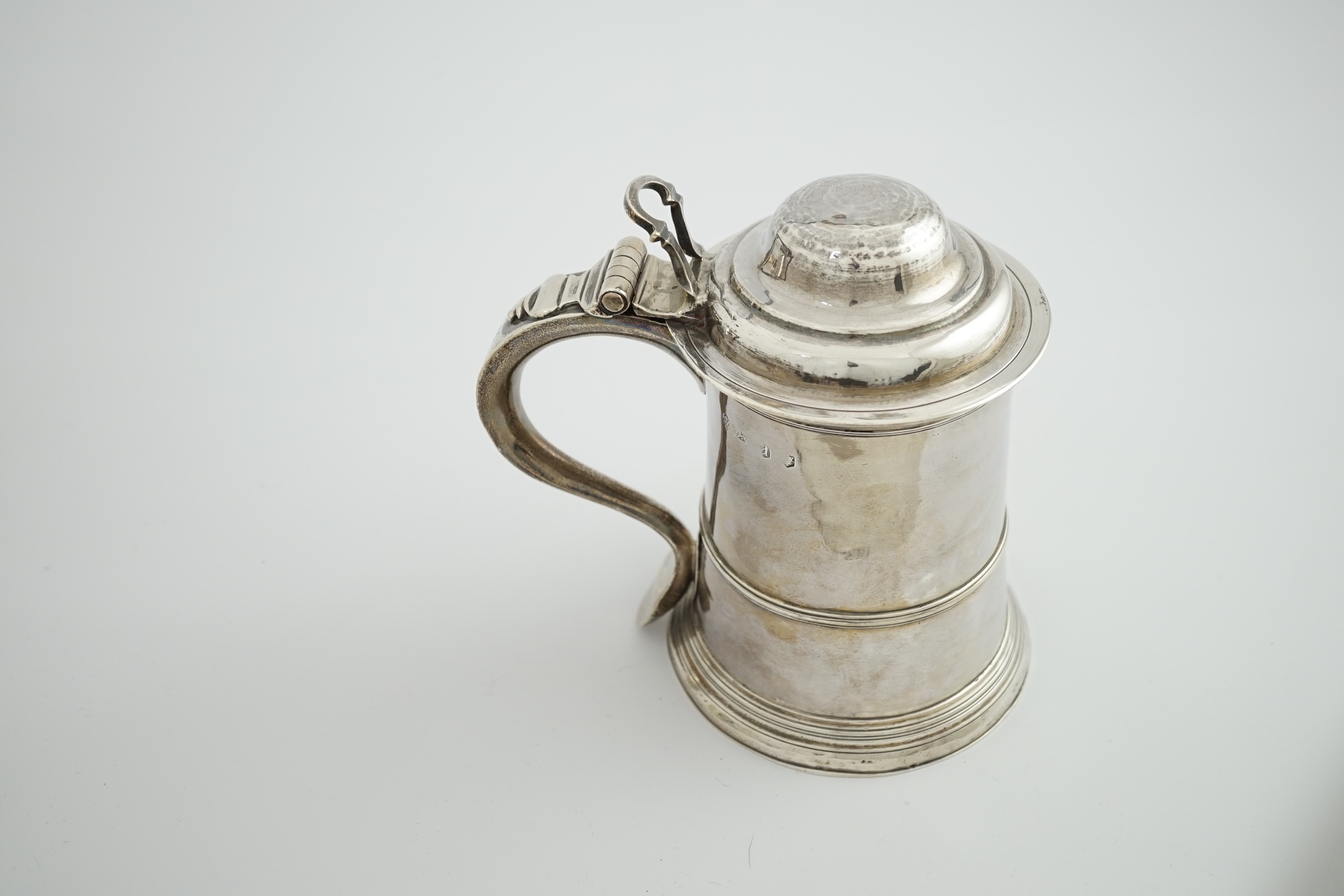 A George II silver tankard, indistinct maker's mark